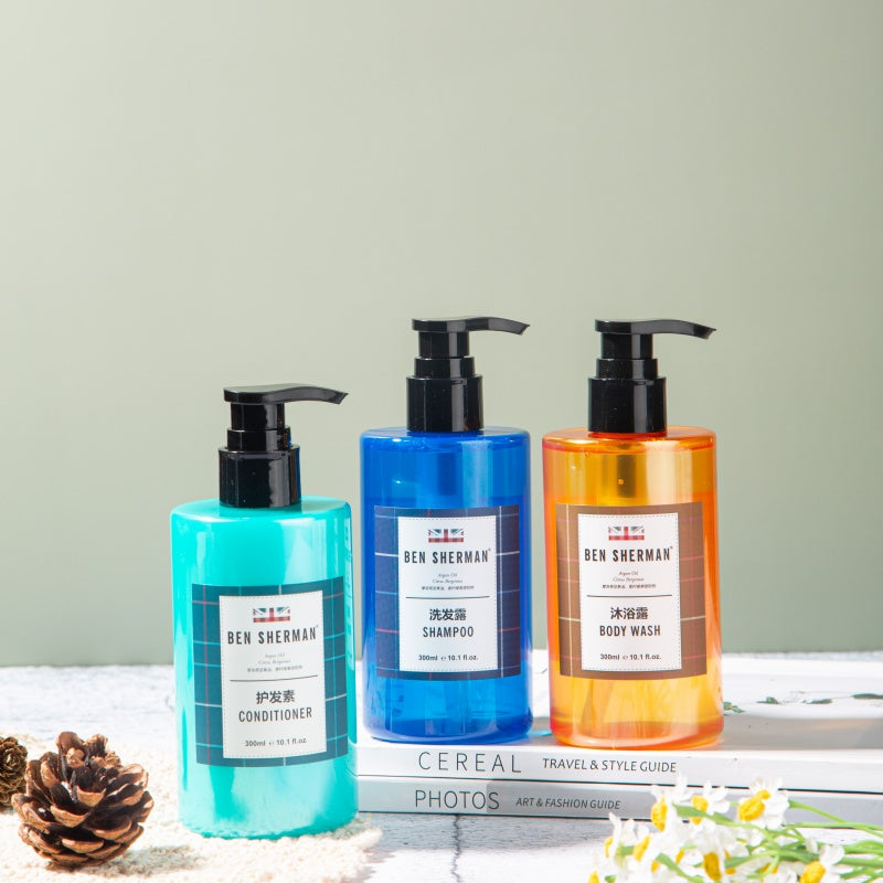 three bottles of BEN SHERMAN hotel toiletries.