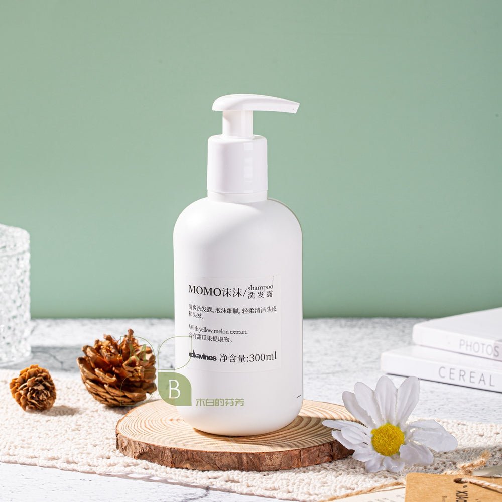 DAVINES MOMO body lotion, hotel-shampoo-conditioner