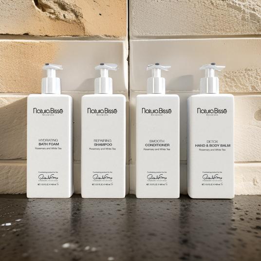 Natura Bisse body lotion, hotel-shampoo-conditioner